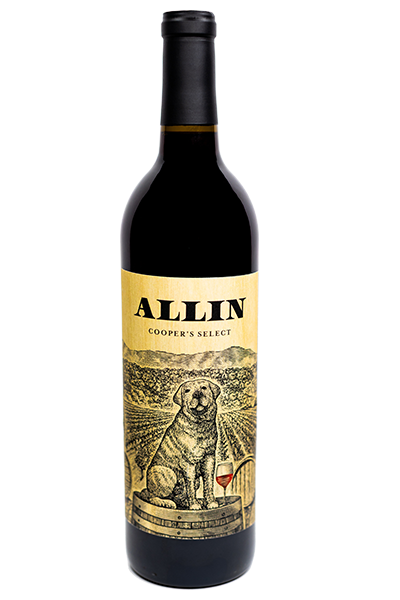 A wine bottle labeled ALLIN Coopers Select featuring a drawing of a dog sitting on a wine barrel.